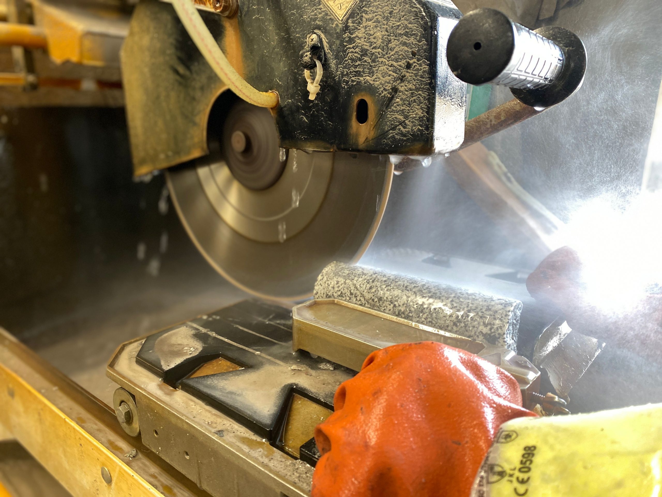 Photo of a saw cutting the drill core