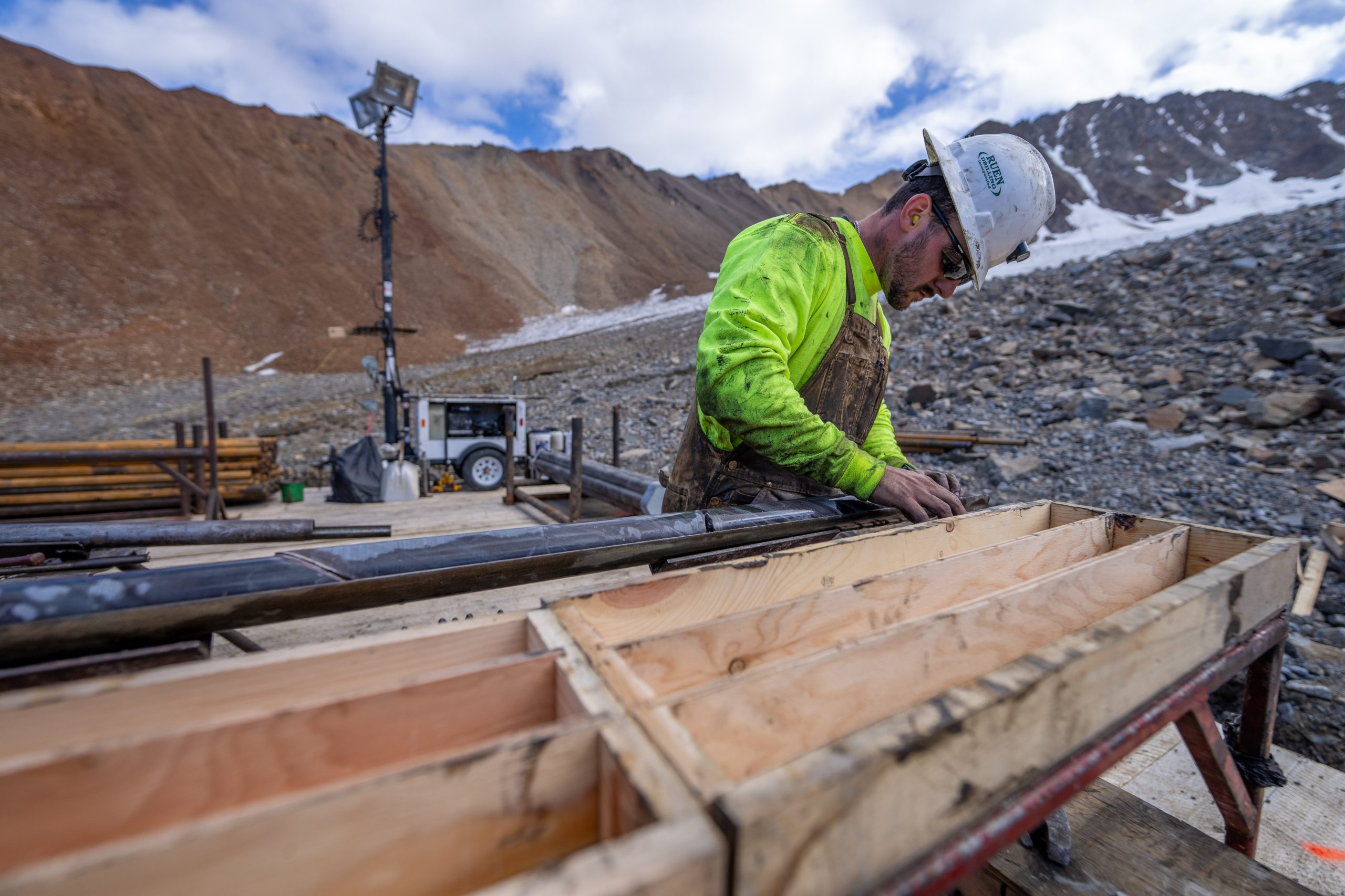 Photo of driller marking up drill core at RPM