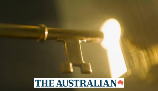 Image of gold key in door lock