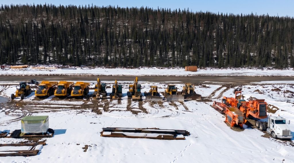 IMage of all the mining equipment including haul trucks, excavators, bulldozer, screen plant delivered to the snow Estelle site.